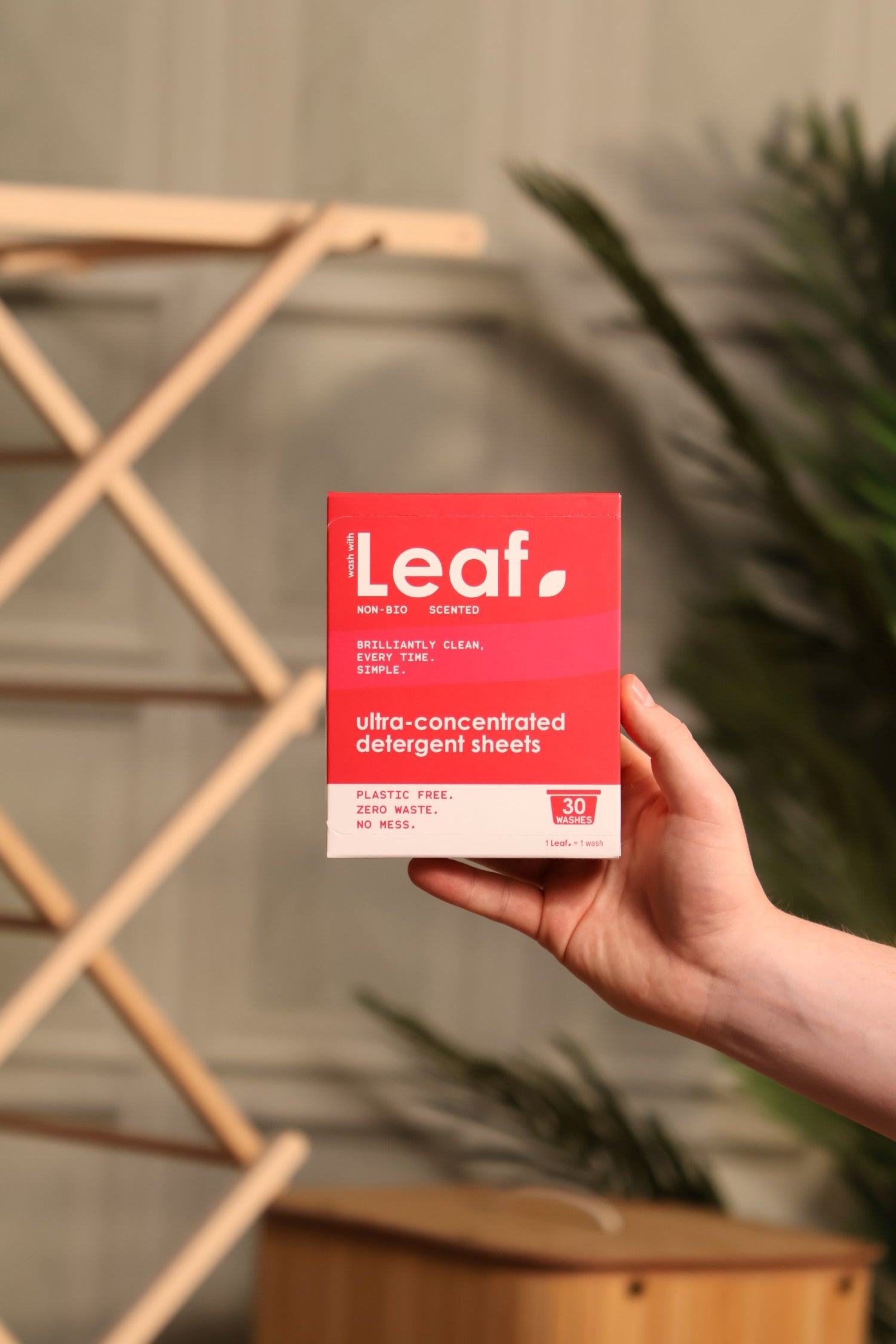 Wash with Leaf non-bio pack, held in hand